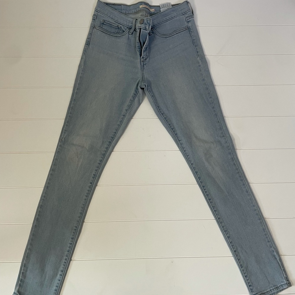 LEVI’S 311 shaping skinny light wash worn denim